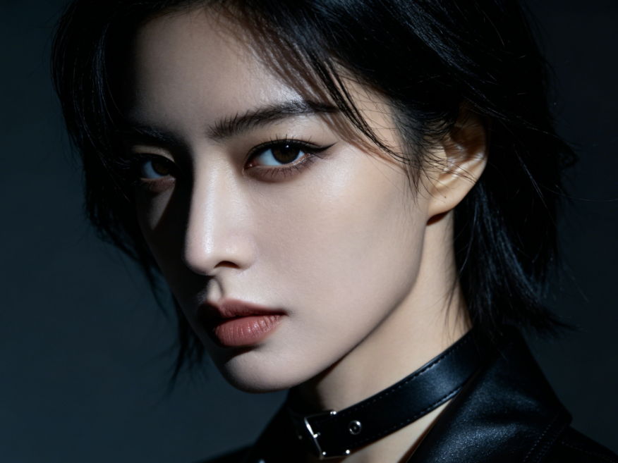Dark moody studio portrait of a European American woman, sharp facial features with black leather turtleneck, low-key lighting, dark simple background, original image for AI brown eye filter