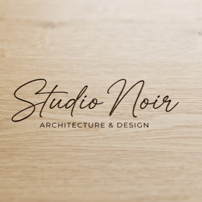 A 1:1 architectural-style logo mockup. A signature logo "Studio Noir" featuring ultra-thin, precise lines that form a modern cursive script. The logo is laser-etched into a light oak wood surface. The wood grain is sharp and detailed, reflecting a focus on natural materials and clean design.