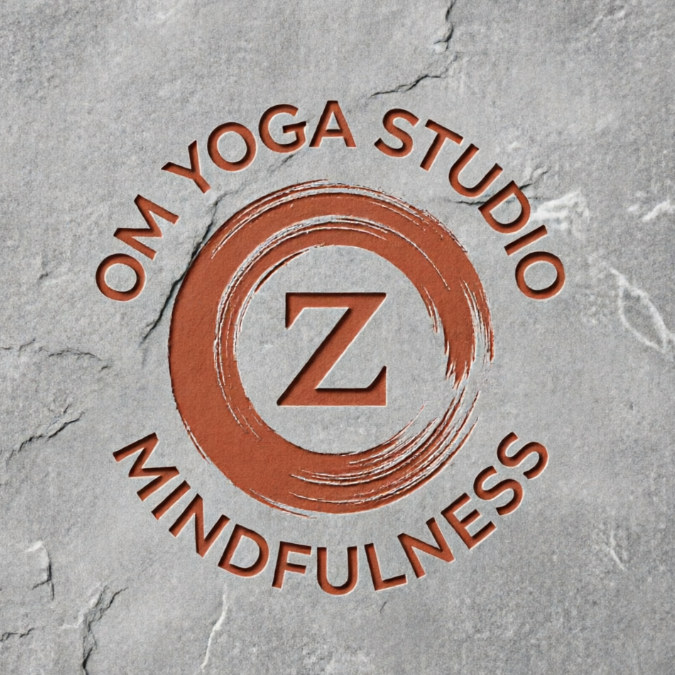 A 1:1 minimalist Zen monogram logo. The letter 'O' is formed by a brush-stroke Enso circle. In the center is a simple 'Z'. Circular text 'OM YOGA STUDIO' and 'MINDFULNESS'. Terracotta red on a zen-grey stone texture.
