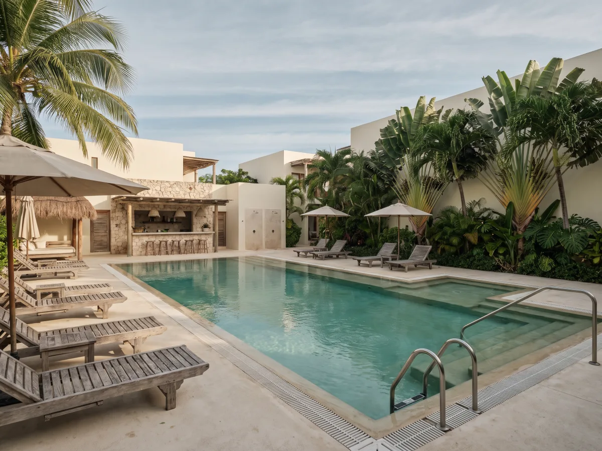 Family-friendly poolscape with swim, lounge, and play zones