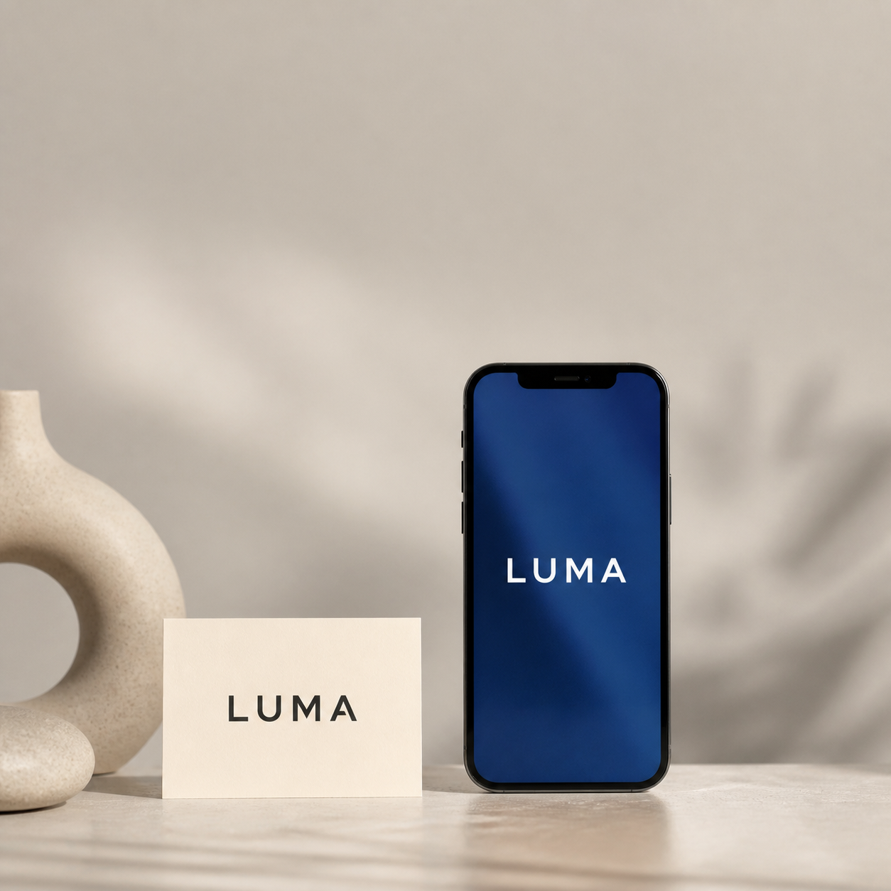 AI-generated business name displayed on a premium startup brand card and mobile mockup