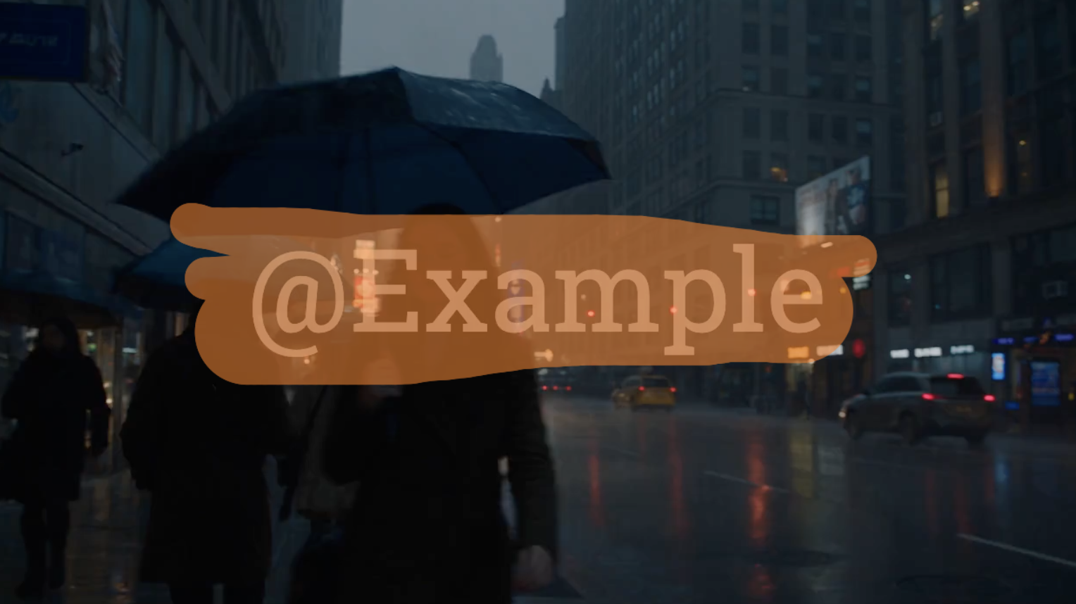 Video frame with an orange mask painted over a username watermark