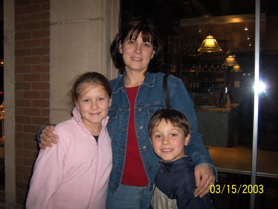 Family photo with a visible date-only camera stamp